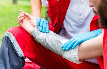 Injured Person With Medical Worker